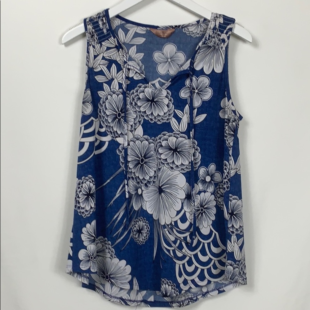 SJS blue flowered sleeveless top size Med.